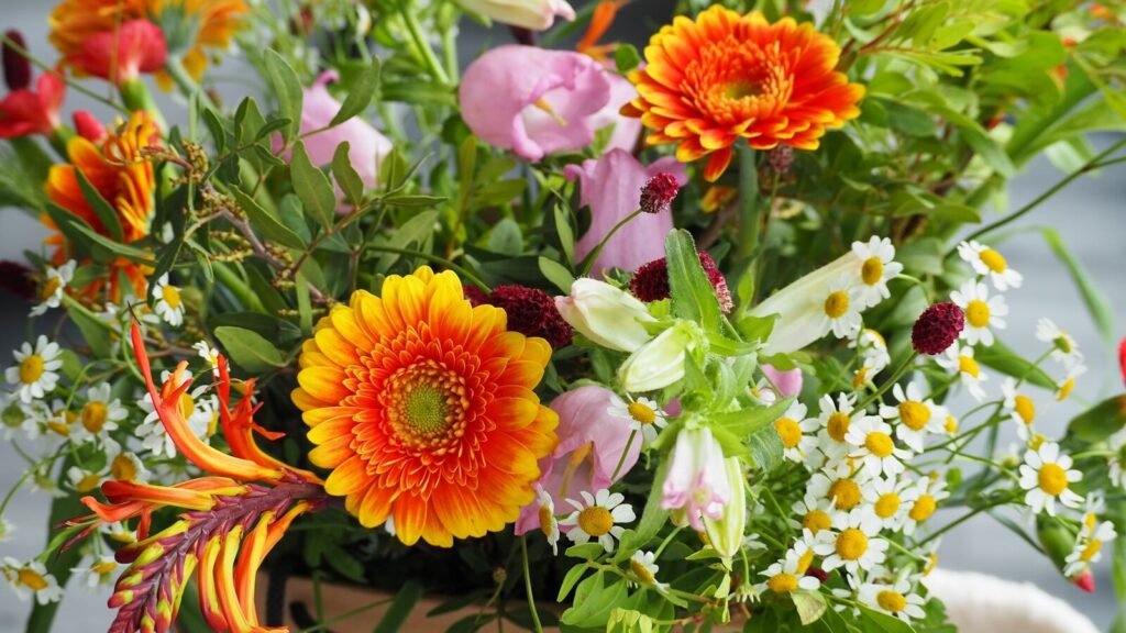 a bunch of flowers that are in a vase